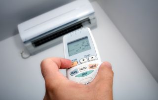 Closeup view about using some appliance such as air condition.