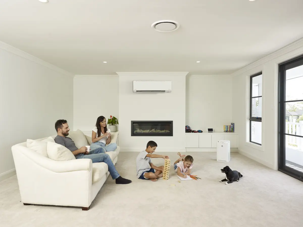Mum and Dad on Lounge – Kids playing on the Floor-1-min System design is critical to successful Daikin installation